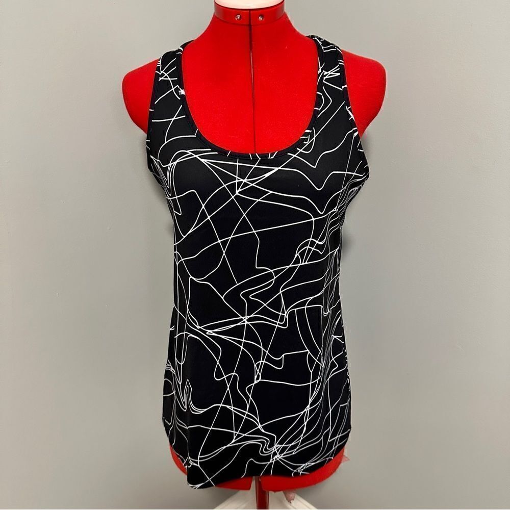 Two Fabletics workout tops. Size small.